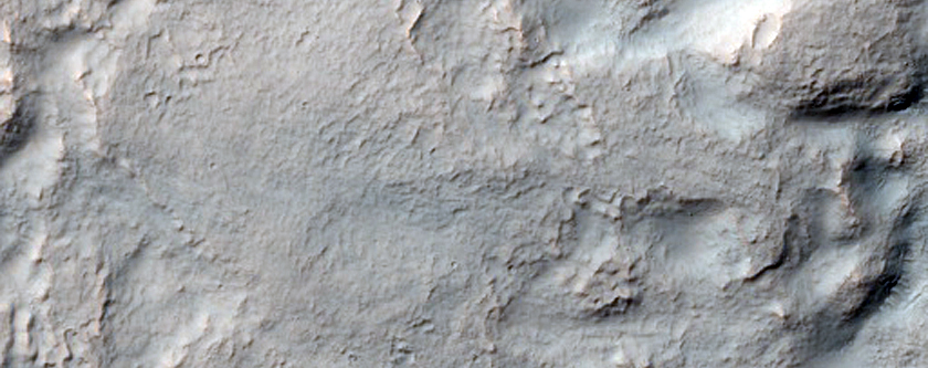 Crater Ejecta Blanket and Relation to Underlying Topographic Features