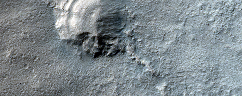 Layered Deposit along Reull Vallis