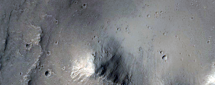 Crater with Large Mass Movement Features Off South Wall