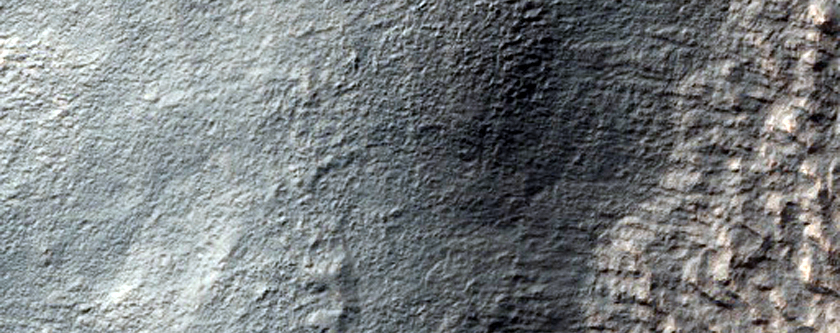 Layered Structures in Promethei Terra