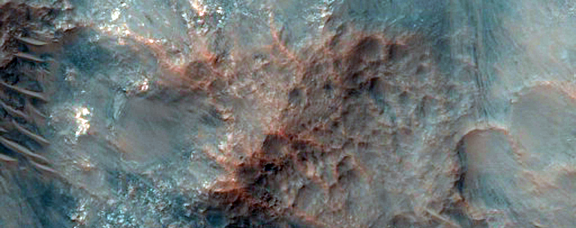 Exposed Bedrock on Western Side of 42-Kilometer Crater Central Uplift