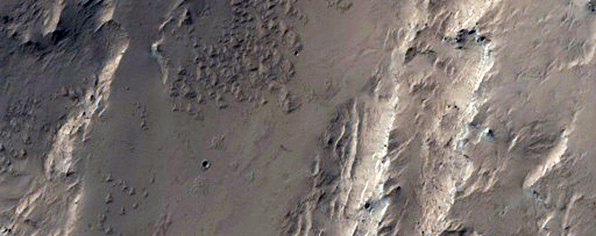 Layered Bedrock Exposed in Crater Wall