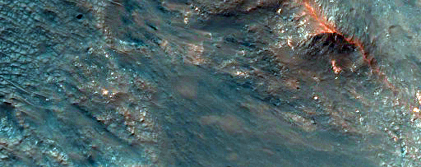 Exposed Bedrock on Western Side of 42-Kilometer Crater Central Uplift