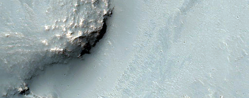 Wrinkle Ridge Superimposed on Well-Preserved Crater