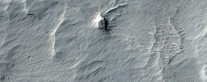 Pit in Memnonia Sulci