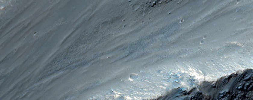 An Impact Crater on the Upper Rim of Valles Marineris