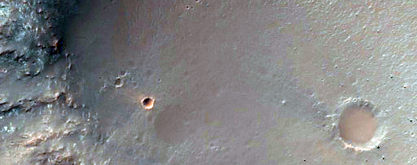 Possible Olivine in Tyrrhena Region Crater