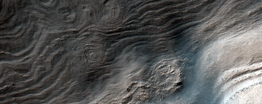 Terraces or Strata on Slope in Crater near Southeast Hellas Region