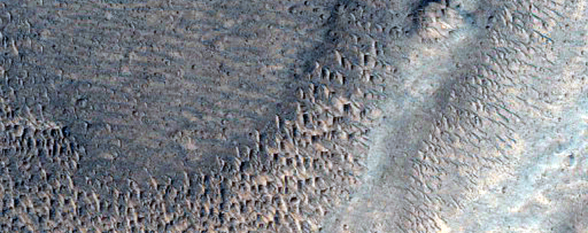 Small Crater Cut by Wrinkle Ridge