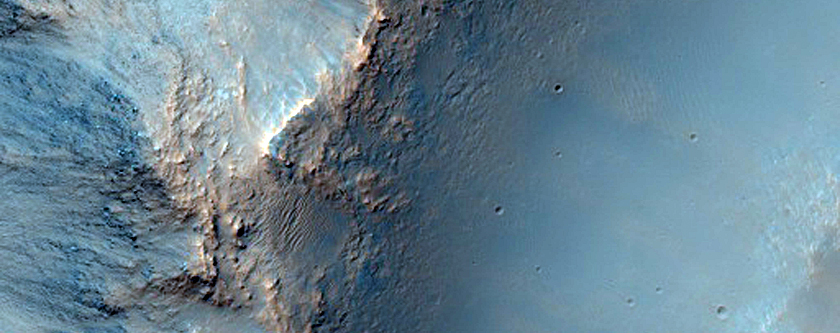 Eastern Rim of Crater in Tyrrhena Terra with Possible Olivine Signature