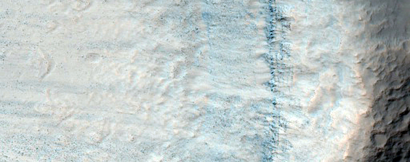 Impact Crater Exposing Bedrock