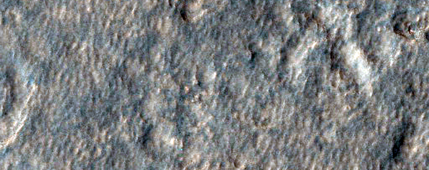 Fluvial Feature Apparently Emanating from Rampart Crater Ejecta