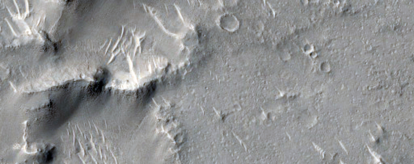 Ejecta and Rays Associated with Crater in Isidis Planitia