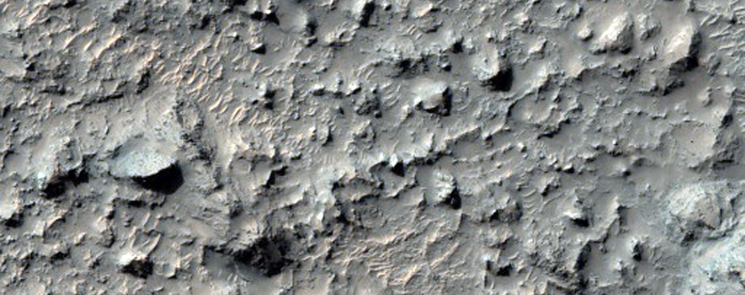 Pit on Crater Floor with Layered Material