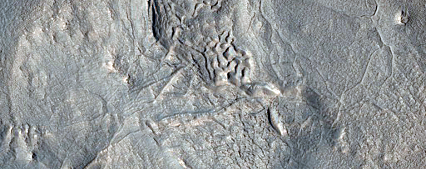 Layered Feature in Mesa Notch in Deuteronilus Mensae