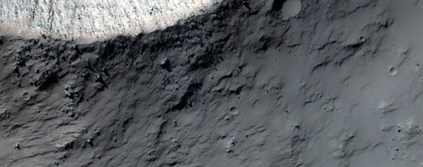 Small Impact Crater Superimposed on the Sirenum Fossae