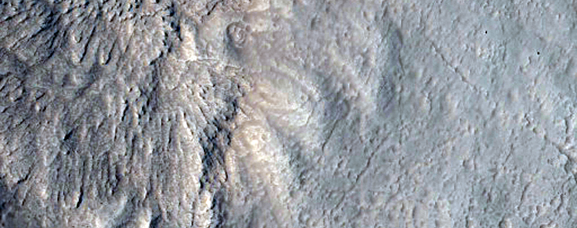 Well-Preserved 6-Kilometer Impact Crater Near Tinjar Valles
