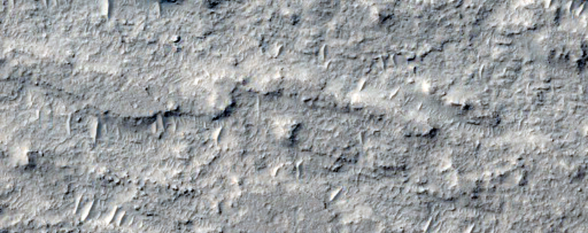 Flow Surface and Linear Features West of Meridiani Planum