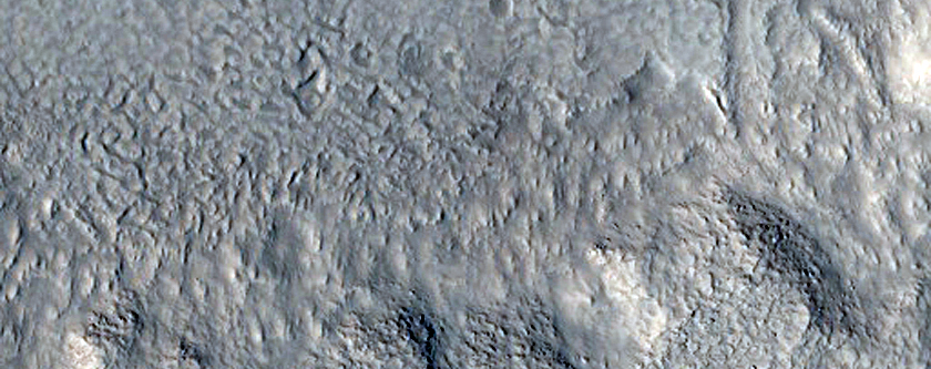Crater with Viscous Flows and a Channel