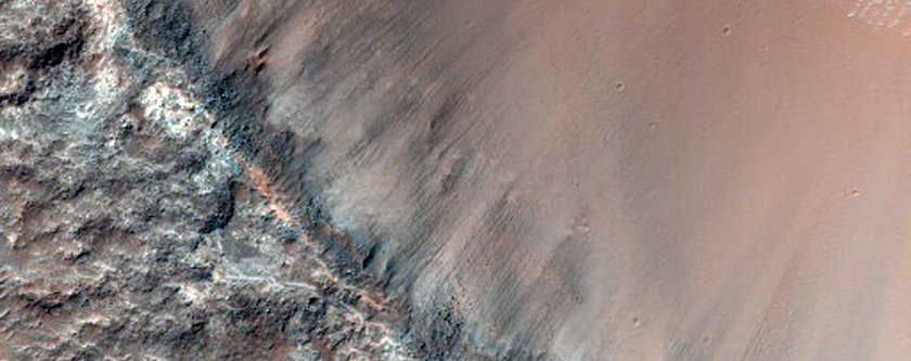 Small Crater in Terra Tyrrhena with Olivine Signature