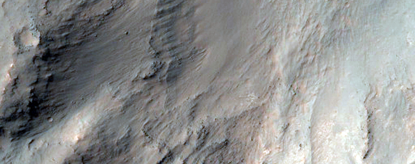 Well-Preserved Impact Crater on Floor of Coprates Chasma