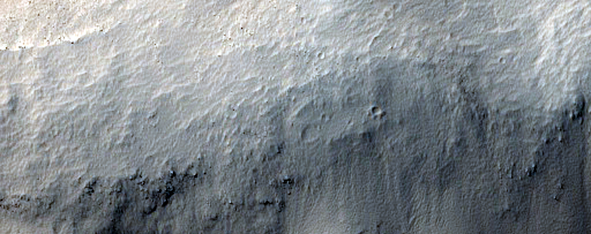 Hills with Slope Streaks Embayed by Lava