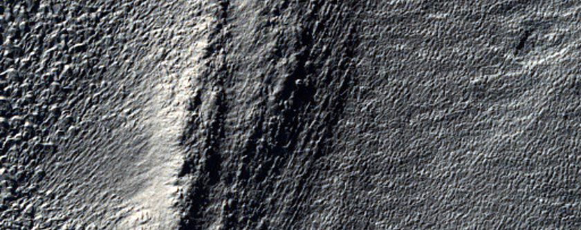 Debris Flow Features on Crater Wall Near Reull Vallis