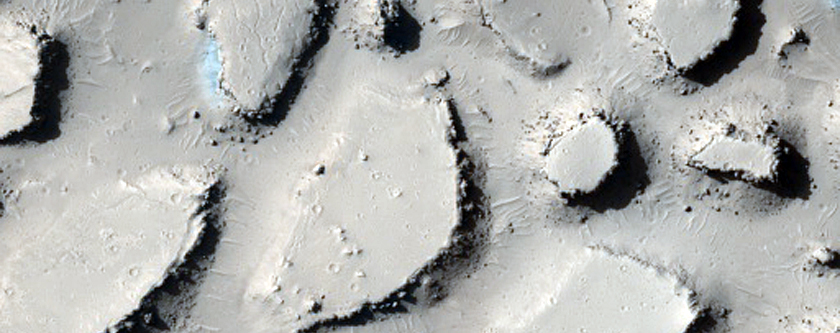 Clusters of Buttes and Mesas among Flows South of Western Cerberus Fossae