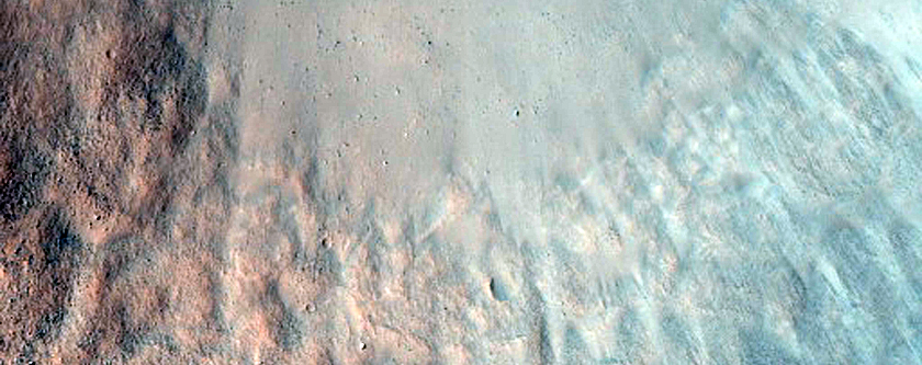 Crater in Southern Syrtis Major Planum with Mafic Signatures
