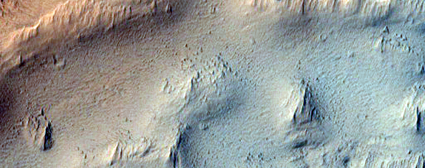 Possible Recessional Moraine Features in Ascraeus Region