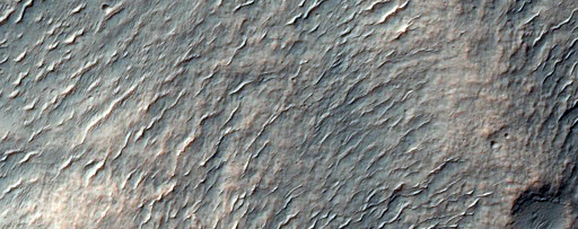Crater Ejecta and Wrinkle Ridge