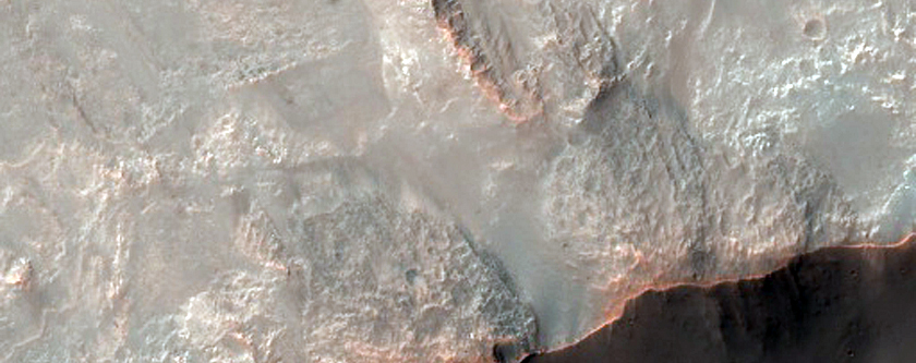 Rocky Impact Crater with Central Pit