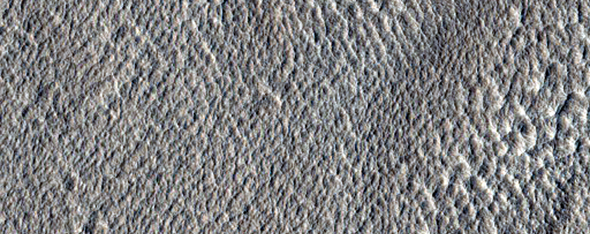 Pit or Crater in Icy Fill Material