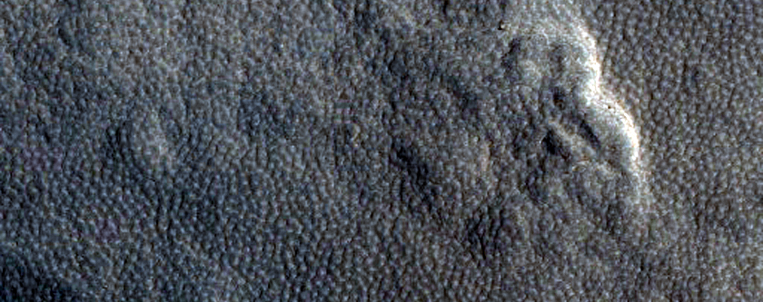 Well-Preserved Impact Crater on Northern Plains
