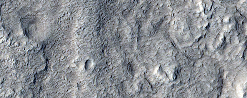 Channels Associated with Ejecta of a Well-Preserved Impact Crater