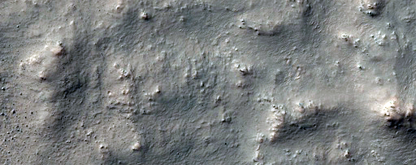 Recent Crater on Rocky Crater Floor