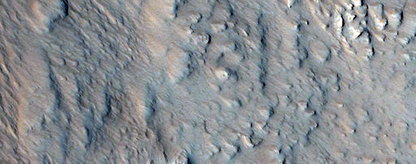 Western Portion of Well-Preserved 15-Kilometer Crater Near Alba Mons