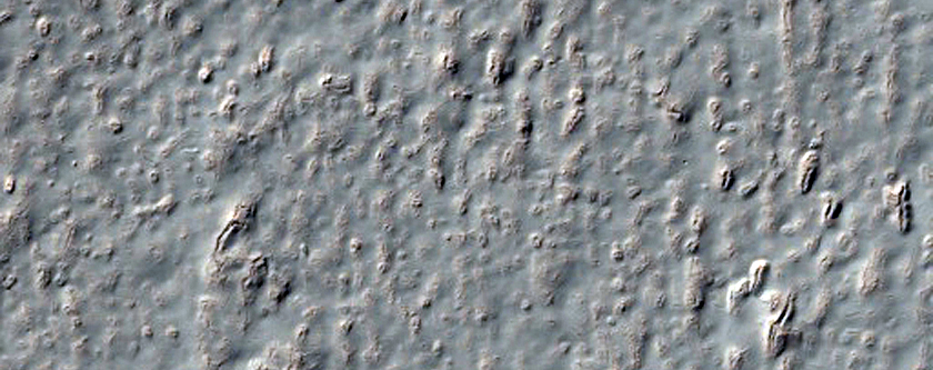 Crater with Ice-Like Flow of Fill Material