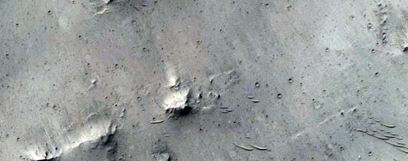 Well-Preserved Impact Crater on Rim of Chia Crater