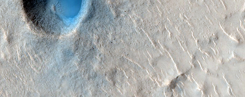 Cones and Crater in Isidis Planitia