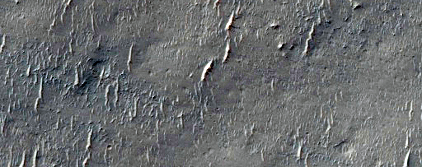 Contact between Layered Impact Ejecta and Eroded Bedrock