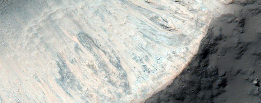 Two Kilometer Diameter Crater with Faint Rays