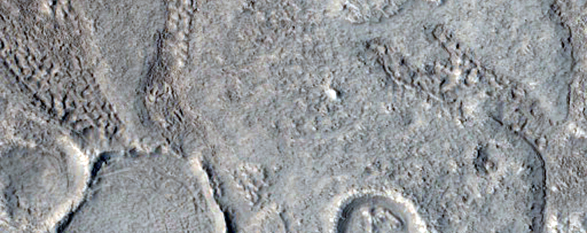 Channels Near North Rim of Moreux Crater