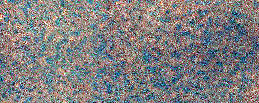Persistent Northern Plains Ice Deposit Leeward of Crater