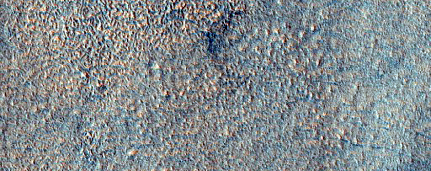 Terrain with Layers and Circular Pits in THEMIS V13028004