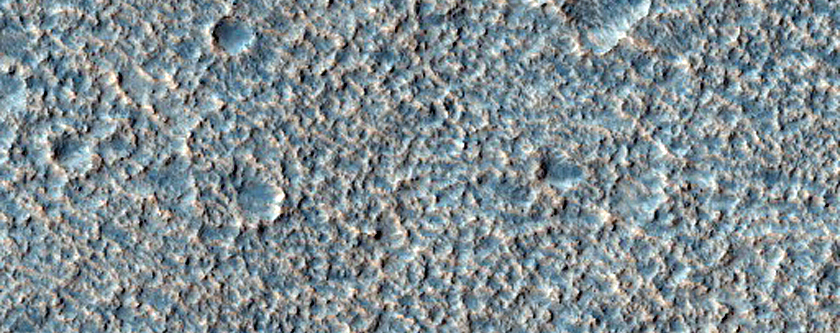 Layering at Peak of Cratered Cone in Chryse Planitia
