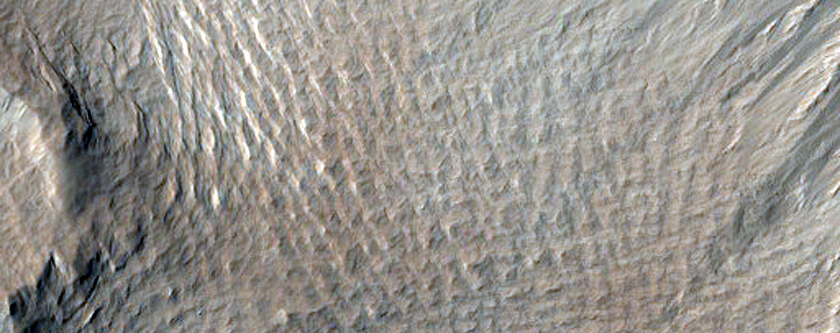 Dark Slope Streak Extending To Channel Floor