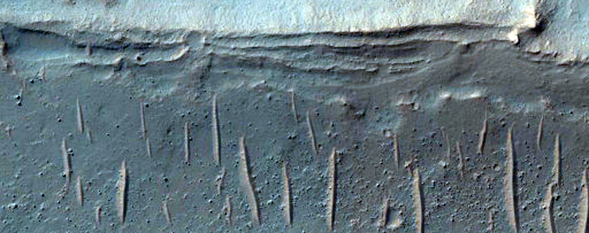Light-Toned Deposits on Floor of Noctis Labyrinthus Trough
