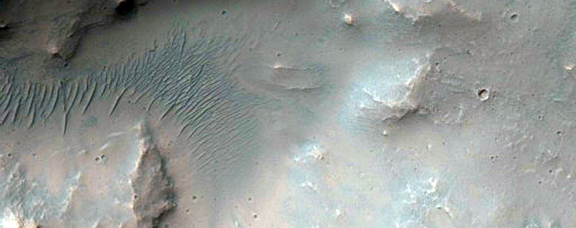 Fresh 5-Kilometer Diameter Crater Near Ophir Catenae
