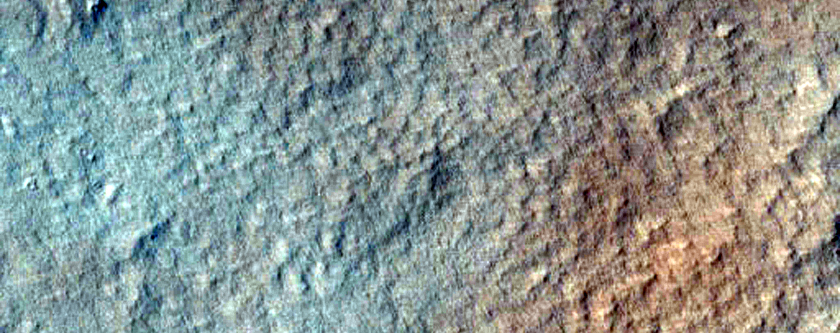 Candidate New Impact Site Formed between Dec 2007 and Dec 2011